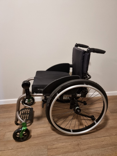 Manual Wheelchair + Power Assist attachment