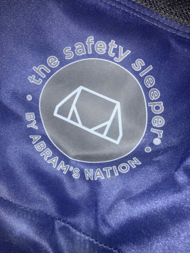 9911_image_of_the_safety_sleeper_by_abrams_nation_logo